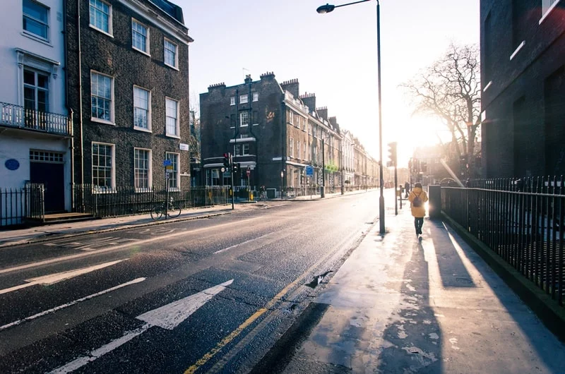 Empty London street with pedestrians