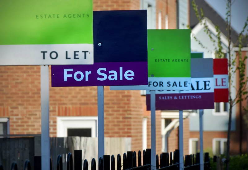 For sale and to let signs outside of houses