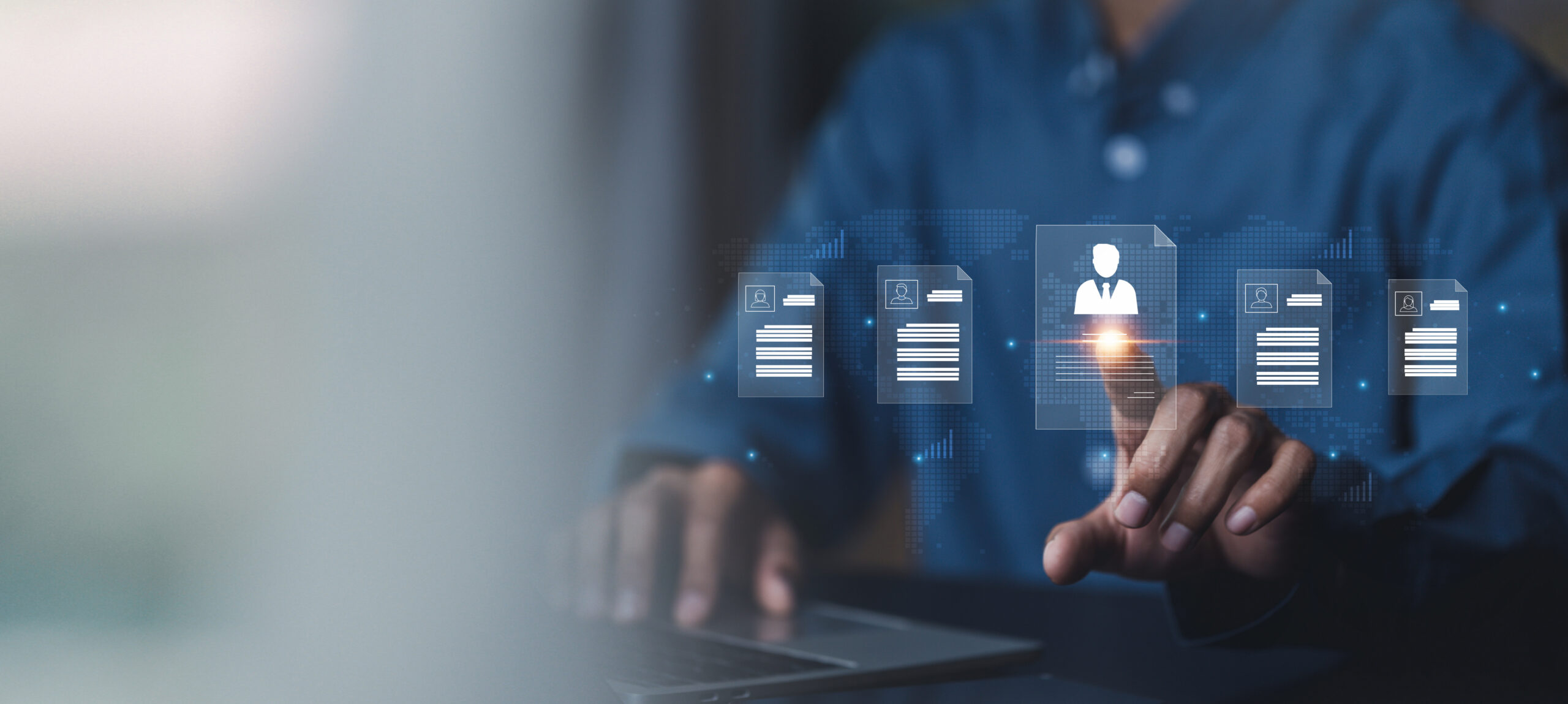 Man Infront of laptop with account information icons above