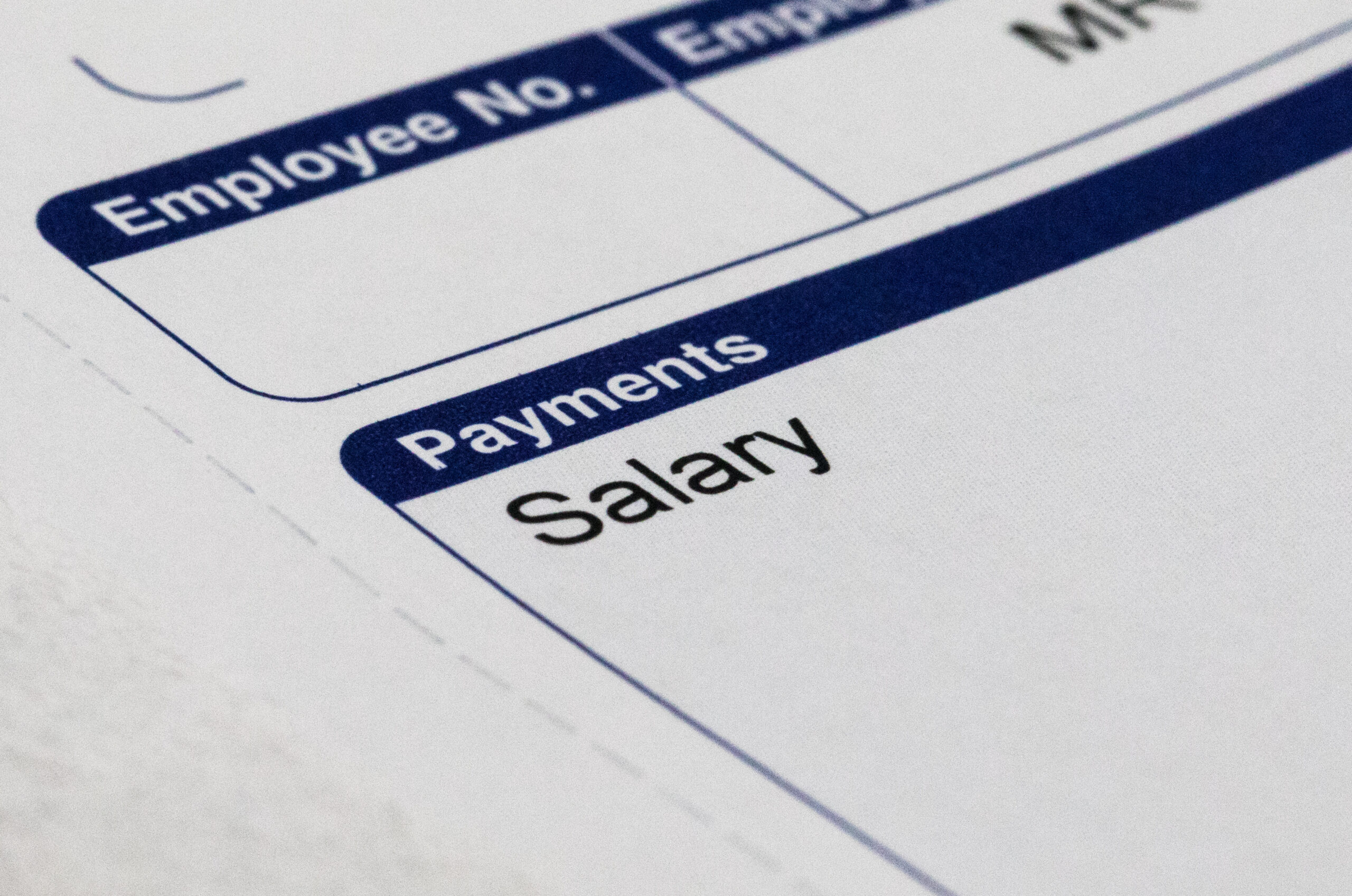 Payslip and money close up shot